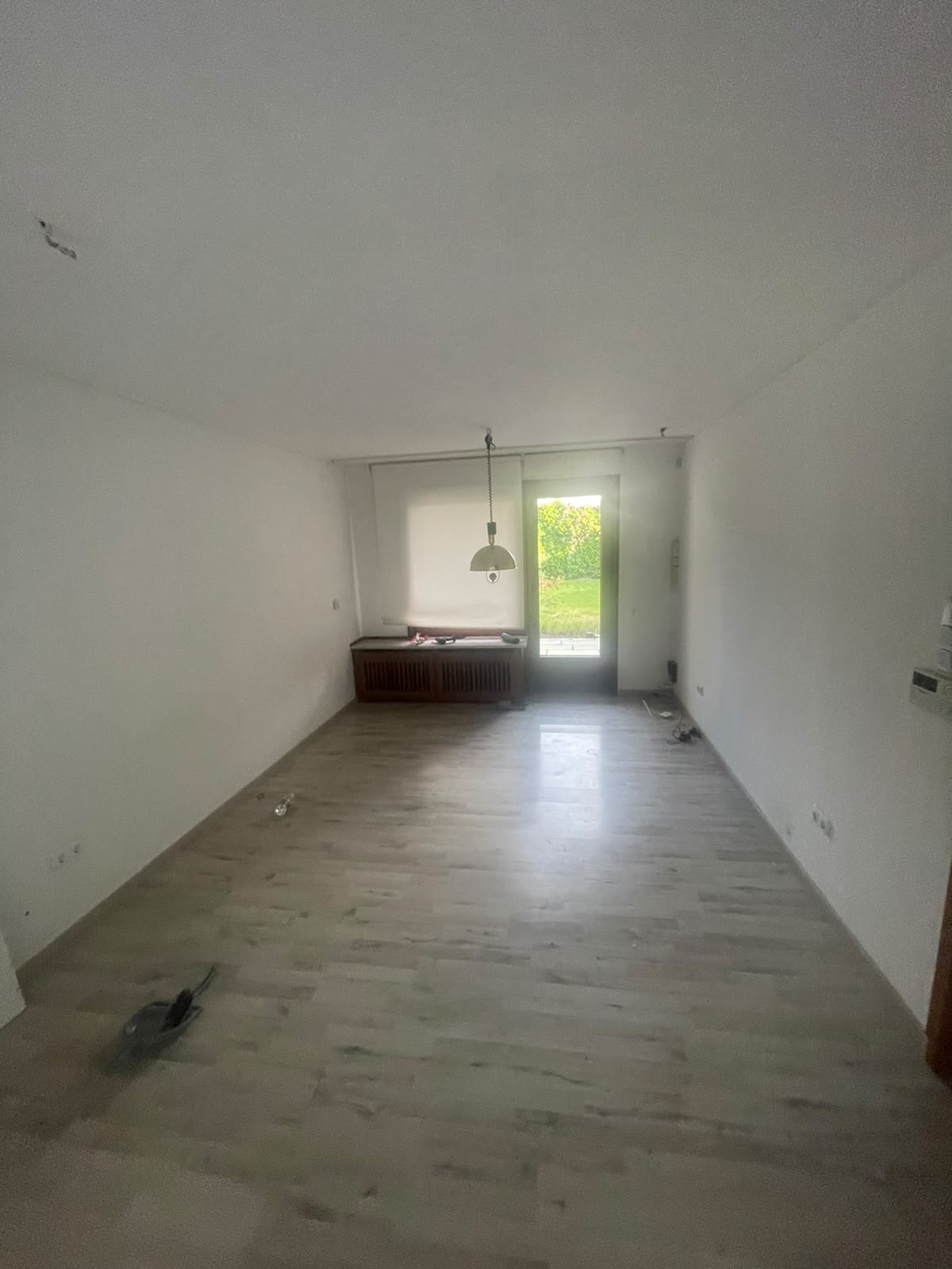 Wohnzimmer vor und nach der Entrümpelung in Hamburg – nachher